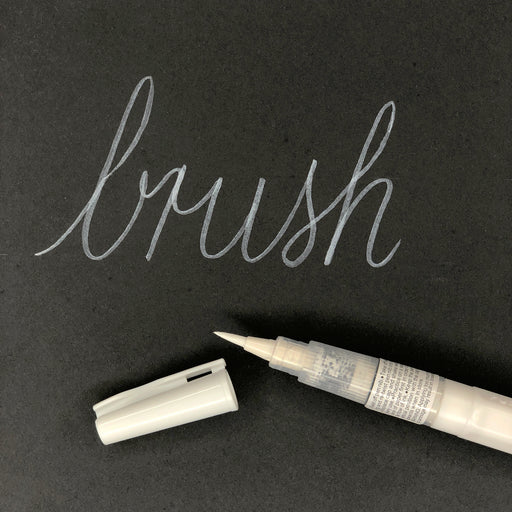 "Brush" written out using the White Kuretake Small Brush Pen